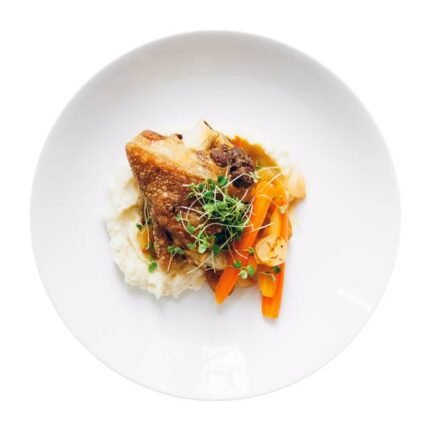 Seared chicken with braised onions